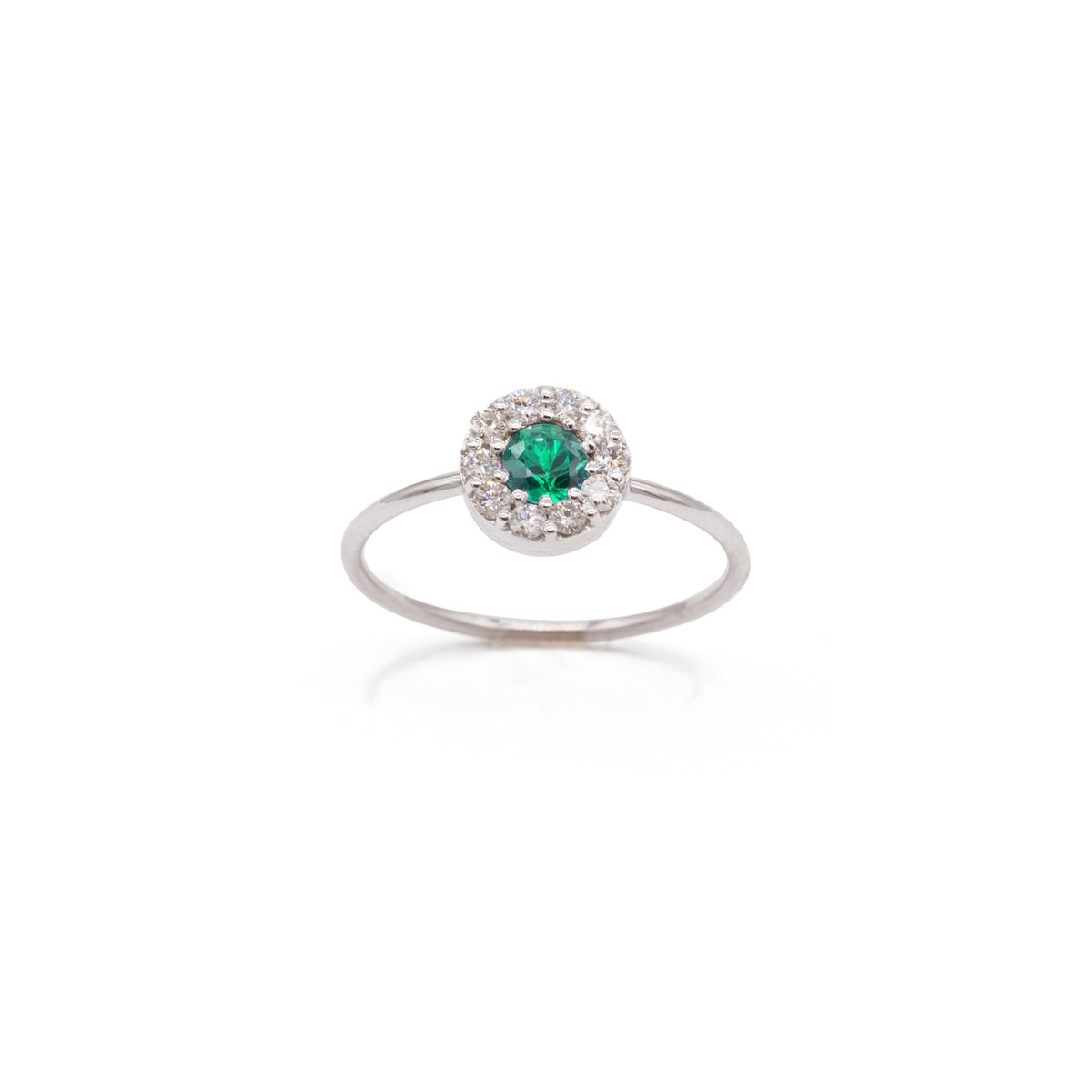 Thin ring with diamonds and emerald