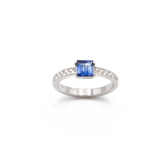Ring with diamonds and square sapphire