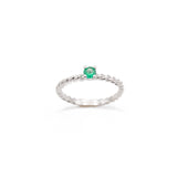 White gold braided ring with central emerald