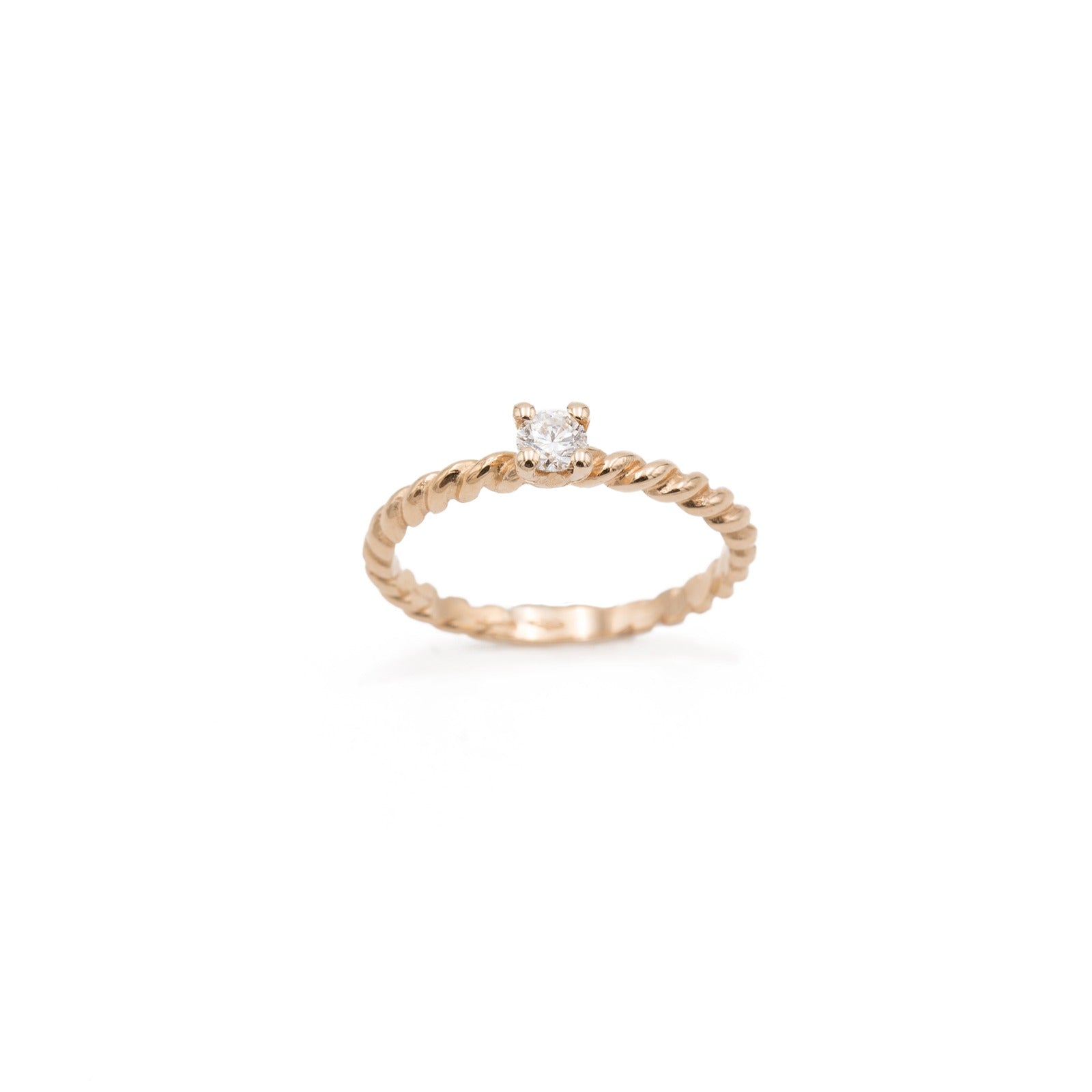 Rose gold braided ring with central diamond