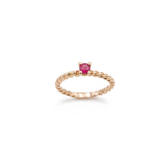 Rose gold braided ring with central ruby